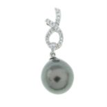 A platinum brilliant-cut diamond and cultured pearl pendant.