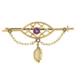 An early 20th century 9ct gold garnet, split pearl and pearl brooch.
