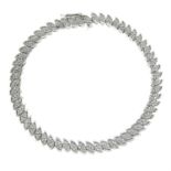 A 9ct gold single-cut diamond bracelet.