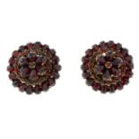 A pair of late 19th century silver garnet cluster earrings.
