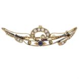 An Edwardian 15ct gold blue paste and split pearl brooch.