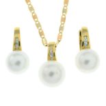A cultured pearl and colourless gem pendant with chain, together with a pair of matching earrings.