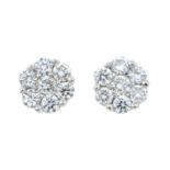 A pair of 18ct gold diamond cluster stud earrings.