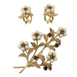 A 9ct gold cultured pearl and garnet floral brooch, with a pair of matching clip earrings.