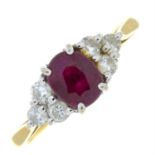 An 18ct gold ruby and brilliant-cut diamond trefoil ring.