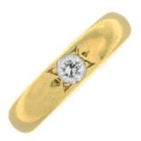 An early 20th century 22ct gold brilliant-cut diamond single-stone band ring.