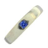 A 9ct gold band ring, with sapphire highlight.