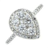 An 18ct gold brilliant-cut diamond cluster ring, with brilliant-cut diamond shoulders.