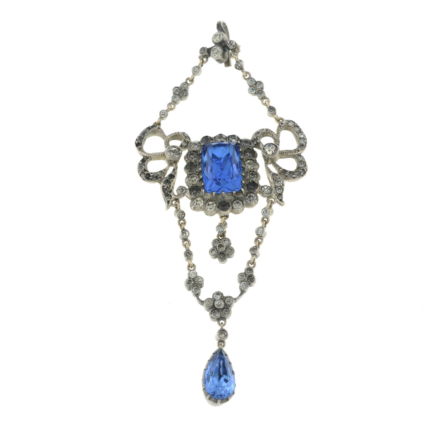 An early 20th century silver blue and colourless paste pendant.