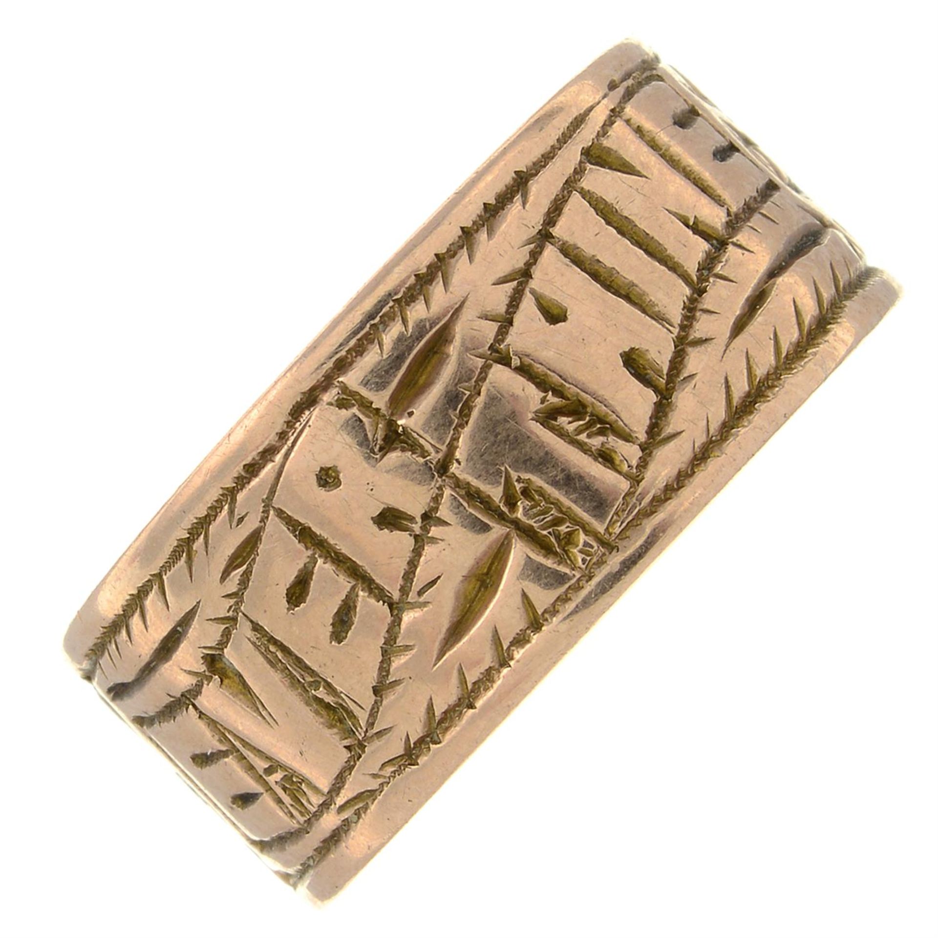 An early 20th century 9ct gold 'Ever Thine' foliate band ring.