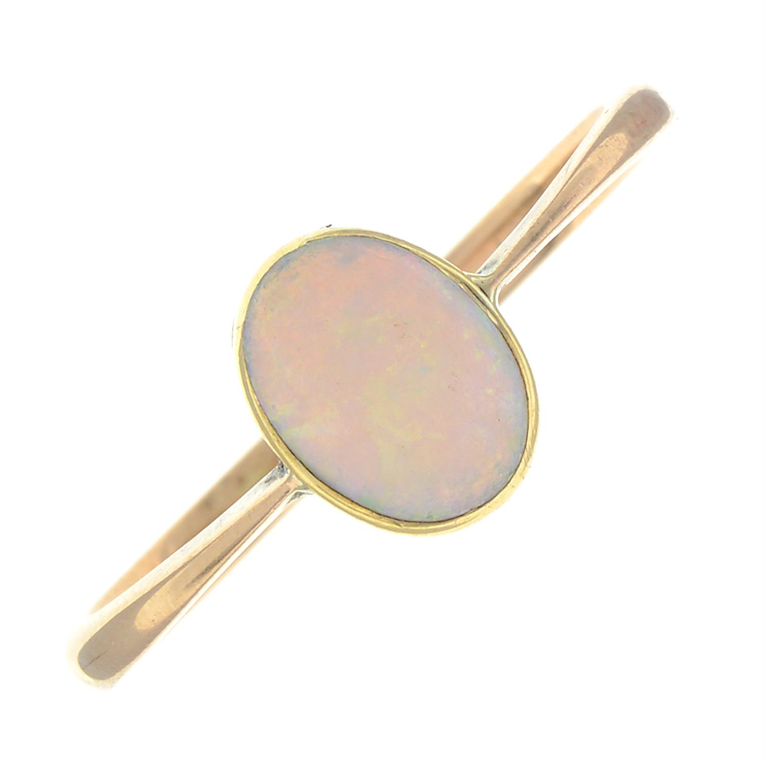 An early 20th century gold opal single-stone ring.