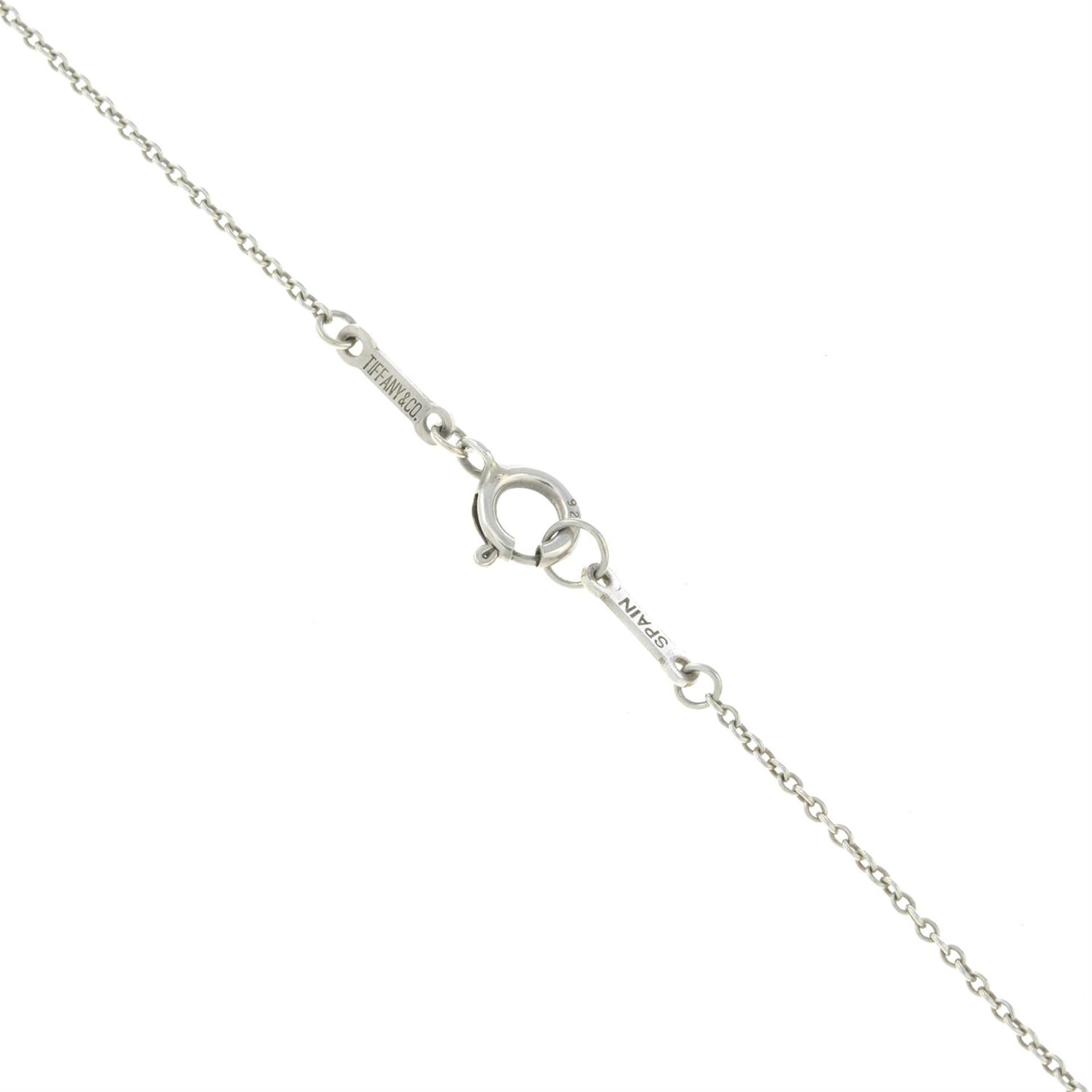 An 'open heart' pendant, with chain, by Elsa Peretti for Tiffany & Co. - Image 3 of 4