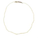 An early 20th century 9ct gold clasp single-stand seed pearl necklace, with saftey chain.