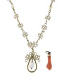 A late Victorian coral hand pendant, together with a later filigree baroque cultured pearl necklace.