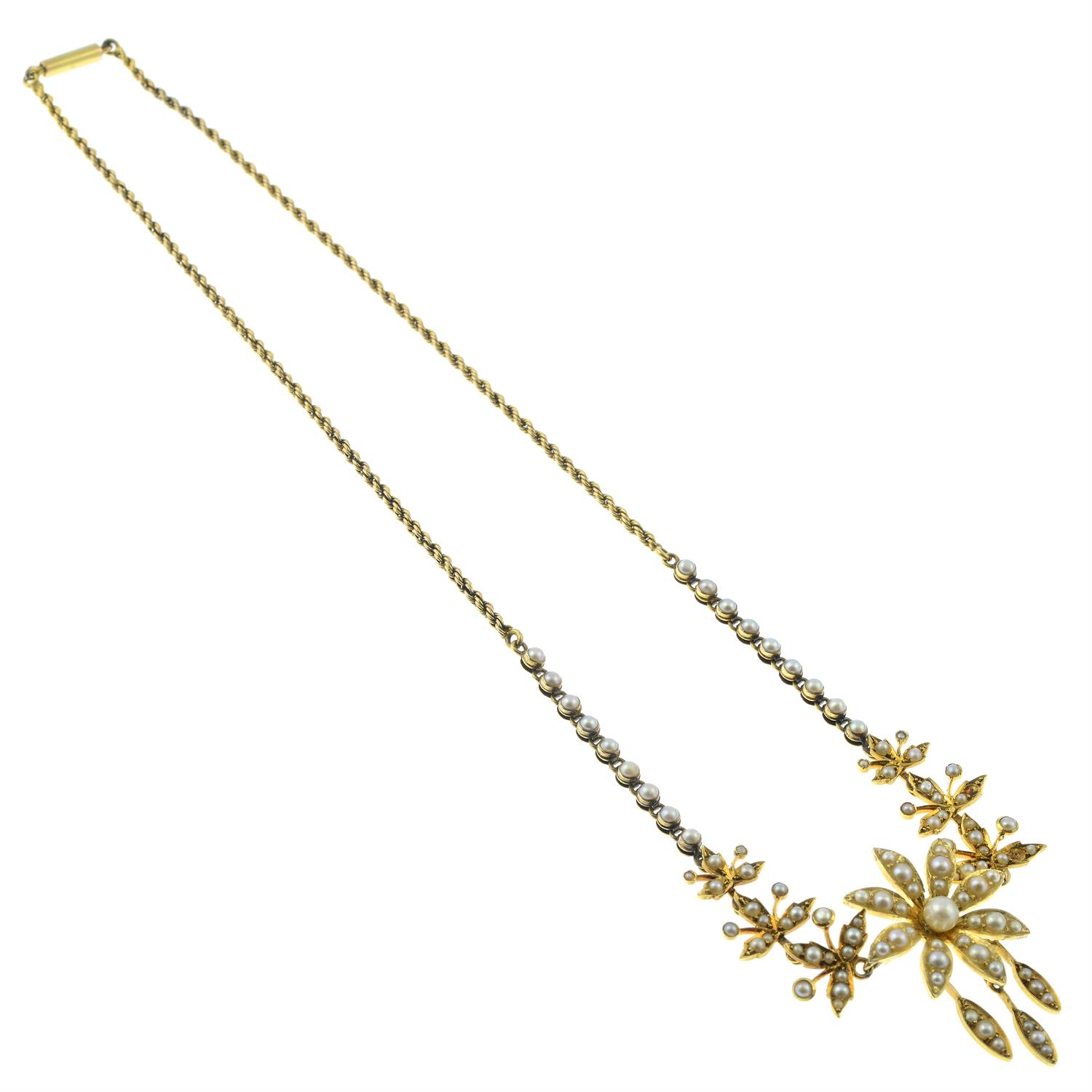 An early 20th century gold seed pearl and split pearl floral necklace. - Image 3 of 3