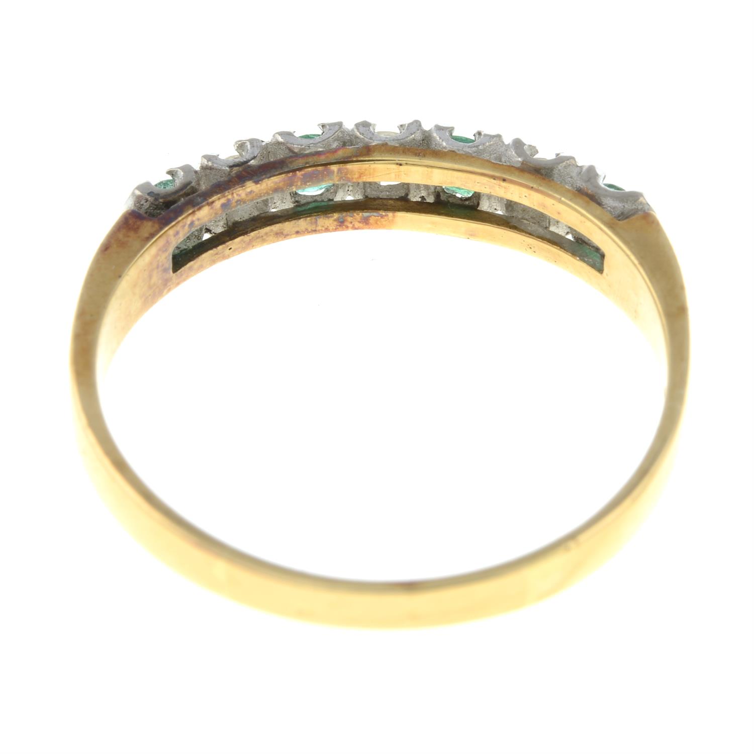 An 18ct gold emerald and brilliant-cut diamond half eternity ring. - Image 2 of 3