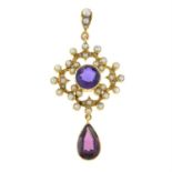 An early 20th century amethyst and split pearl pendant, suspending a garnet drop replacement.