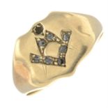 An early 20th century 9ct gold signet ring, with rose-cut diamond masonic motif.