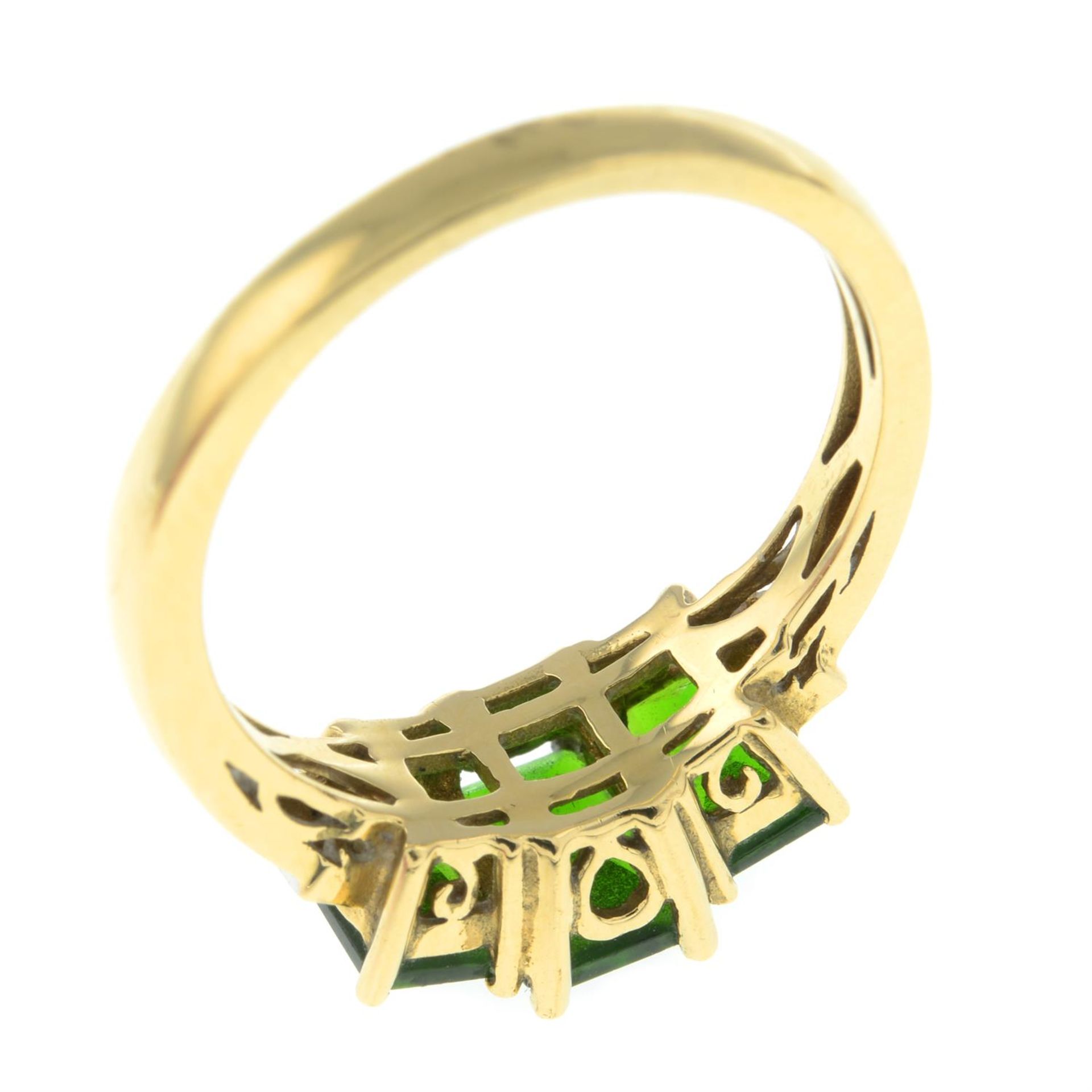 An 18ct gold green tourmaline three stone-ring, with diamond shoulders. - Image 2 of 2