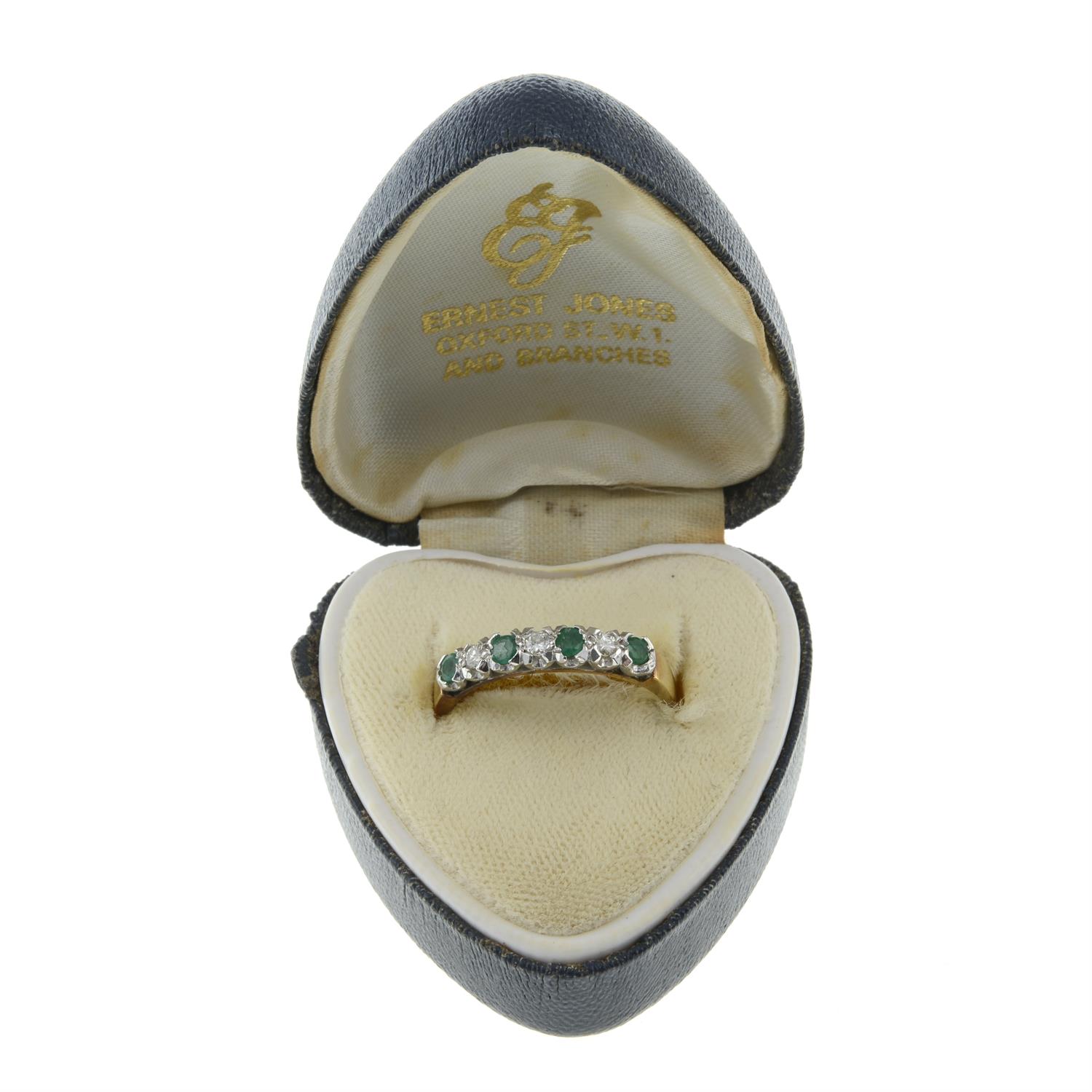 An 18ct gold emerald and brilliant-cut diamond half eternity ring. - Image 3 of 3