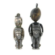 Two early 20th century silver 'FUMSUP' charms.
