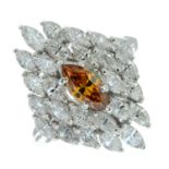 A marquise diamond and citrine cluster ring.