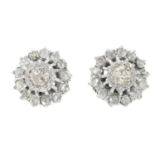 A pair of old-cut diamond cluster stud earrings.