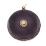 An Edwardian gold purple enamel and seed pearl locket pendant.