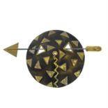 A shield and arrow brooch.