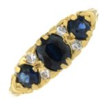 A 1960s 18ct gold sapphire three-stone ring, with single-cut diamond spacers.