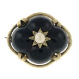 A Victorian black enamel and cultured pearl mourning brooch.