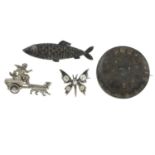 Four late Victorian and later silver brooches, to include an ammonite brooch.