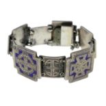 A late Victorian silver enamel engraved panel bracelet.