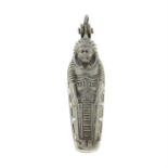 An early 20th century silver enamel Egyptian revival mummy pendant.