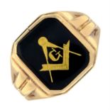 An onyx signet ring, with masonic motif.