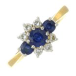 An 18ct gold sapphire and brilliant-cut diamond cluster ring.