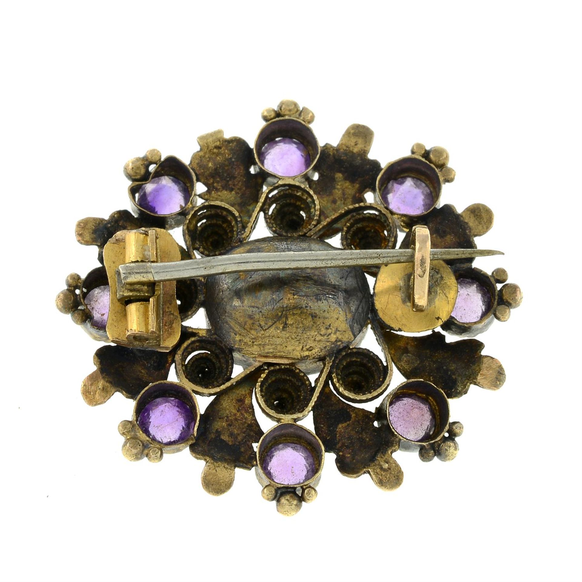An early to mid 19th century gold foil-back amethyst foliate cannetille brooch. - Image 2 of 2