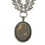 A Victorian silver bi-colour locket pendant, with book-link chain.