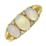 An opal and single-cut diamond ring.