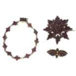 Three items of late 19th century red paste jewellery, to include two brooches and a bracelet.