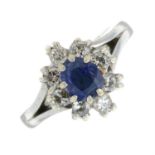 A sapphire and brilliant-cut diamond cluster ring.