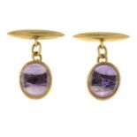 A pair of early 20th century gold amethyst cufflinks.