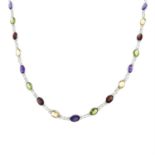 A silver multi-gem necklace.