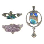 Two Arts and Crafts silver enamel brooches and a pendant.