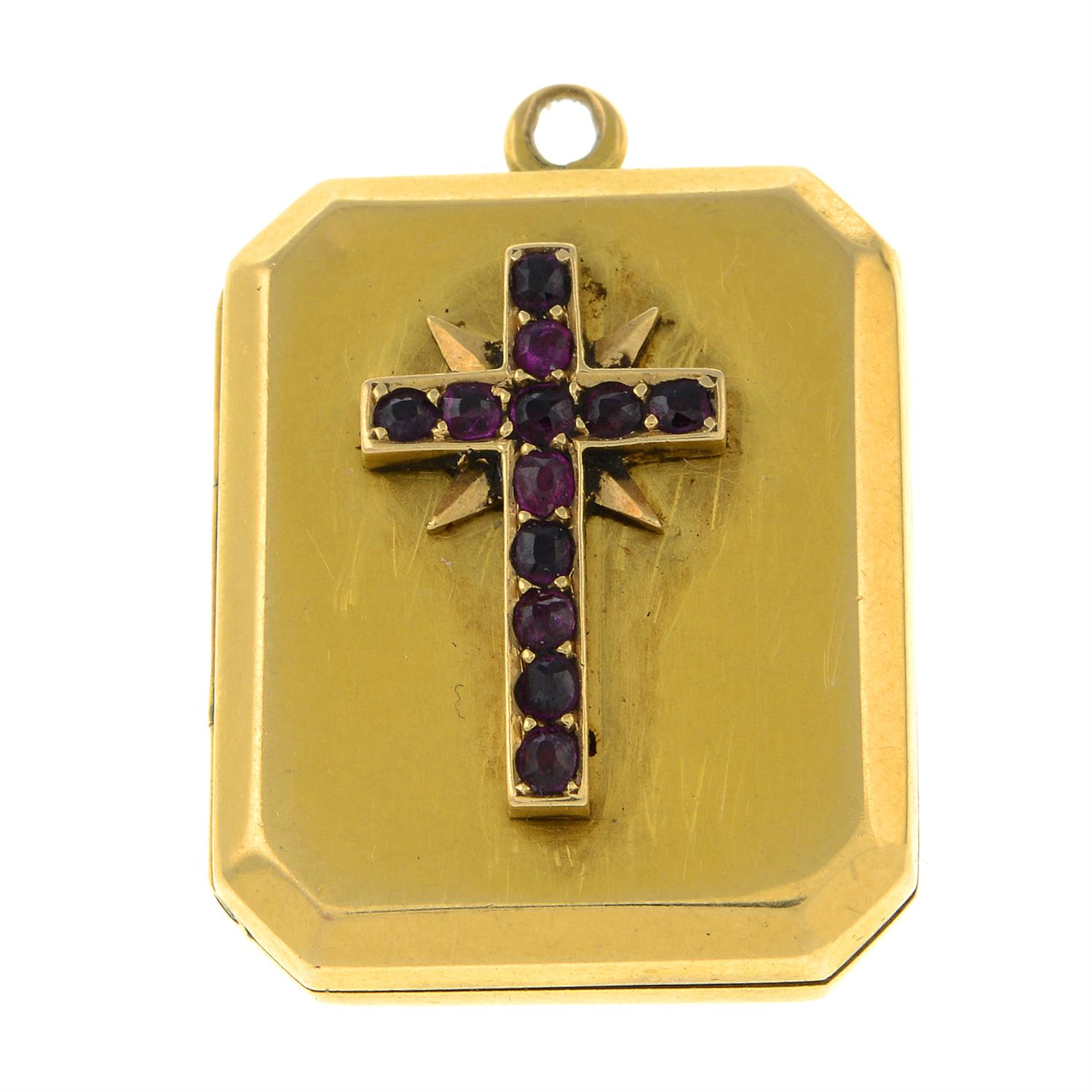 A rectangular-shape locket, with synthetic ruby cross detail.