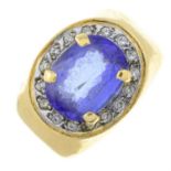 An 18ct gold tanzanite and brilliant-cut diamond cluster ring.