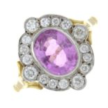 A pink sapphire and brilliant-cut diamond cluster ring.