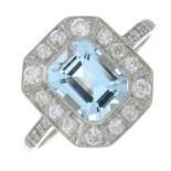 An aquamarine and brilliant-cut diamond octagonal-shape cluster ring.