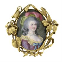 A late 19th century gold porcelain portrait brooch, depicting a woman in Rococo dress,