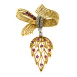 A ruby and vari-cut diamond fancy bi-colour brooch, with suspended foliate drop.